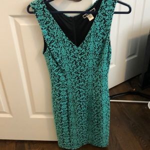 Green and black patterned dress